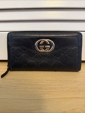 Gucci Black leather Embossed GG Zip Around Wallet with Silver hardware